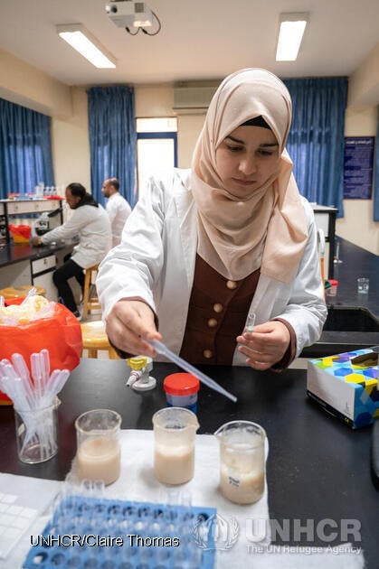 Girl studying in a medical lab.