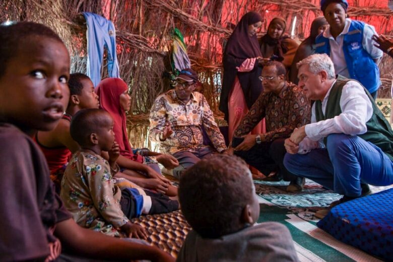 UN High Commissioner for Refugees Filippo Grandi visits a Somali family who recently arrived at a temporary site near Dagahaley refugee camp, Kenya. © UNHCR/Samuel Otieno